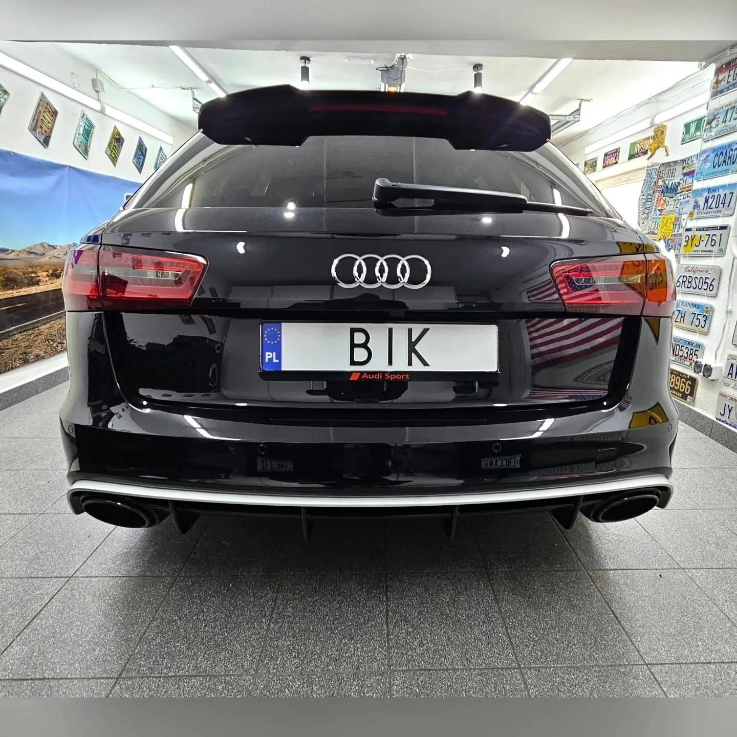 Tył czarnego Audi A6 Avant w studiu detailingu BIK